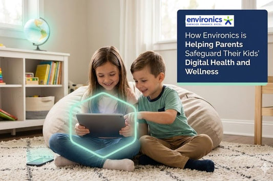Two children using a tablet in a cozy room with a glowing green protective shield representing Environics Envirochip  safeguarding kids' digital wellness from radiation.